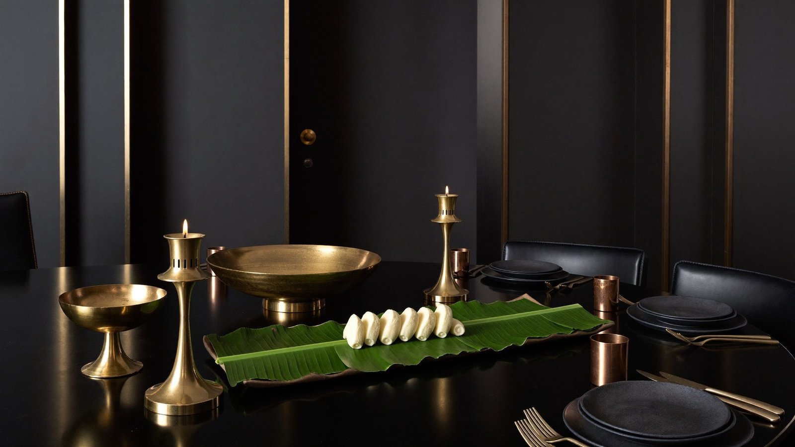 A dark Kerala feast laid out across the Nattinpuram dining table