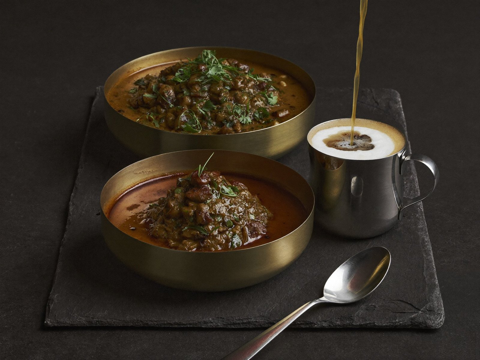 Steamed puttu served with a glass of Kerala coffee
